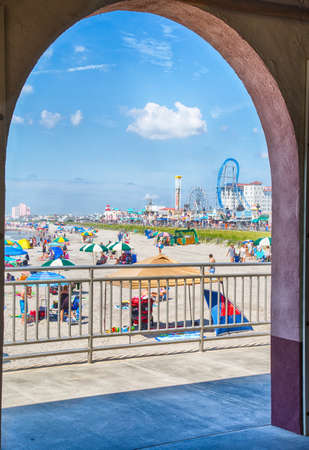 Ocean City, NJ - July, 6, 2016 -vacationers enjoy the sun and sand on Ocean City's boardwalk and beach.のeditorial素材