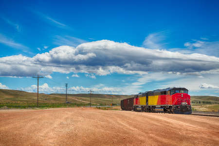 A train moves through Montana hauling goods.の写真素材