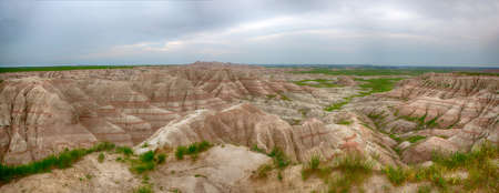 Badlands National Park in South Dakota is full of awe inspiring landscapes and stark geologic formations.の写真素材