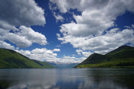 Lake Rotoroa, view up the lake from the car park and boat jetty, Nelson Lakes National Park, New Zealand.の写真素材