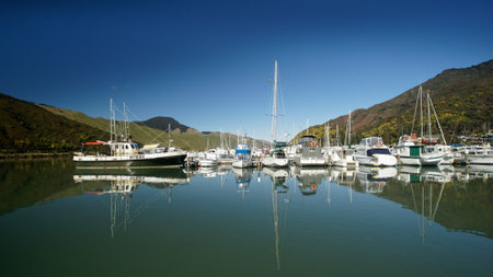 The marina with reflection at Havelock, Marlborough Sounds, New Zealand.のeditorial素材