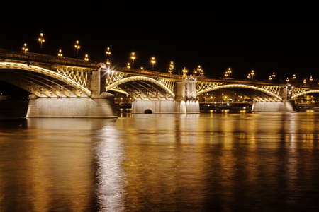 Margaret Bridge over Danube river by night, Budapest, Hungaryの写真素材