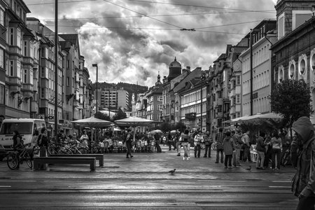 INNSBRUCK, AUSTRIA - SEPTEMBER 17, 2013: Visitors and locals enjoying the pedestrian area in Innsbruck.のeditorial素材