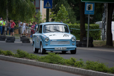 TOTKOMLOS, HUNGARY - JUNE 12, 2011: Laszlo Bodnar in his Trabant 1.1 at the II. Totkomlos Rally on June 12, 2011 in Totkomlos, Hungary.のeditorial素材