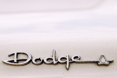 LUDWIGSBURG, GERMANY - APRIL 23, 2017: Dodge Dart oldtimer car at the eMotionen event on April 23, 2017 in Ludwigsburg, Germany. Close-up of the emblem.のeditorial素材