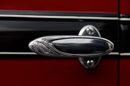LUDWIGSBURG, GERMANY - APRIL 23, 2017: Essex Super Six oldtimer car at the eMotionen event on April 23, 2017 in Ludwigsburg, Germany. Close-up of the door handle.のeditorial素材