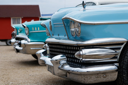 NORDLINGEN, GERMANY - APRIL 29, 2017: Buick Special and Chevrolet Bel Air oldtimer cars at the MotoTechnika oldtimer meeting on April 29, 2017 in Nordlingen, Germany. Front side view.のeditorial素材