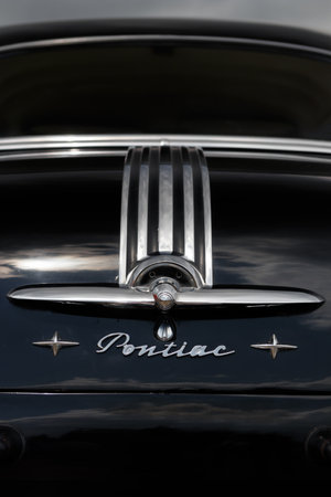NORDLINGEN, GERMANY - APRIL 29, 2017: Pontiac Silverstreak oldtimer car at the MotoTechnika oldtimer meeting on April 29, 2017 in Nordlingen, Germany. Close-up of the rear emblem.のeditorial素材