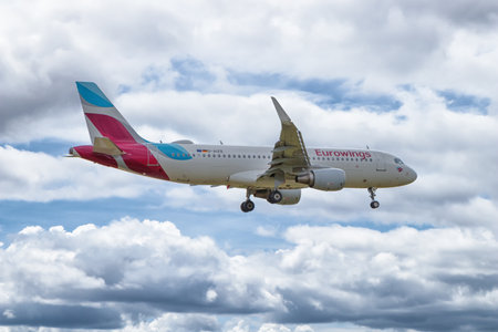 STUTTGART, GERMANY - JULY 1, 2017: Eurowings Airbus A320 D-AIZS short before landing at Stuttgart Airport on July 1, 2017 in Stuttgart, Germany.のeditorial素材