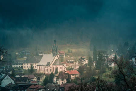 The village of Todtmoos, Germany on a foggy morning from above.の写真素材