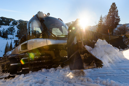 Snowplow Snowcat Ski slopes maintenance on the mountains ski resortの写真素材