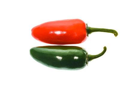Red and green ripe jalapeno chili hot pepper from caribbean or mexico isolated on white backgroundの写真素材