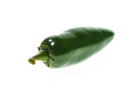 Green ripe jalapeno chili hot pepper from caribbean or mexico isolated on white backgroundの写真素材