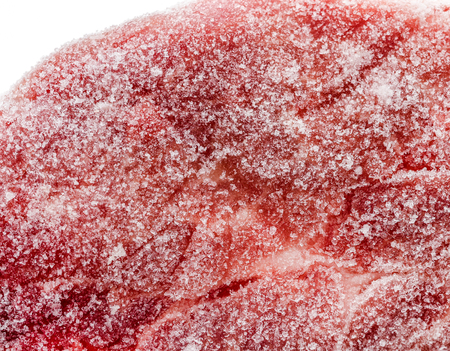 Frozen raw pork neck chops meat steak isolated on white. Frozen uncooked slices of beef steaks, tenderloin or rib eye with ice crystals on it.の写真素材