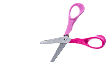 Pink and purple children scissors with plastic handles and blades. Tools for creative and safe children expression.の写真素材