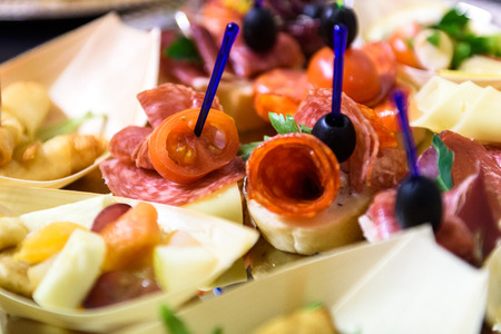 Home made canapes small sandwiches appetizers. Mix of different finger food snacks for a party or...
