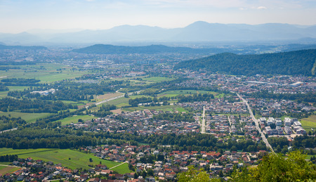 The view of Ljubljana from Smarna gora. View of Ljubljana - the capital of Slovenia from Mount Saint Mary. City, nature, green fields and river Sava from top view.の写真素材