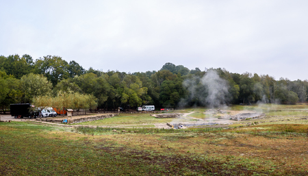 Natural Roman baths outdoors with hot steam and thermal water. Old roman hot springs open air spa and hot natural thermal water in small pools and stone bathtubs. Aquis Querquennis Bande Galicia Spainのeditorial素材