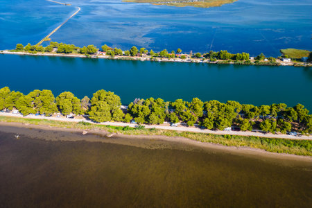 Aerial drone photo view of the campervans and motorhomes parked on  Neretva river delta valley near Ploce, Dalmatia, Croatia.の写真素材