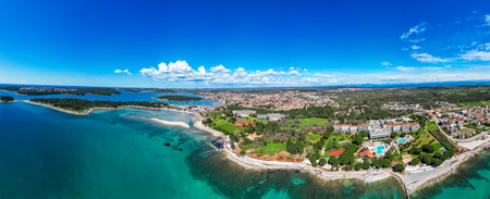 Aerial drone view ofÂ beautiful Medulin city in Istria, Croatia. Amazing sea side photo of touristÂ attractionÂ Medulin near Pula, Croatiaの写真素材