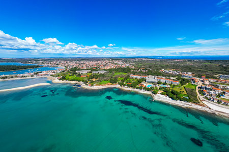 Aerial drone view ofÂ beautiful Medulin city in Istria, Croatia. Amazing sea side photo of touristÂ attractionÂ Medulin near Pula, Croatiaの写真素材