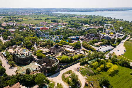 Aerial drone view of an amusement park Gardaland at Lake Garda, Italy. Amazing view of theme park Gardaland in Italy, with  campsites for motorhomes or campervans.の写真素材