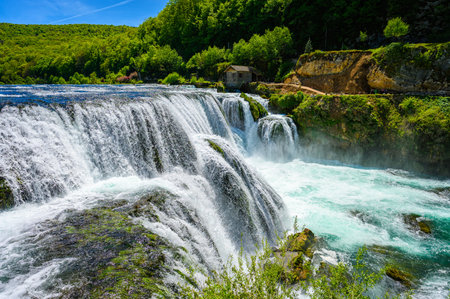 Amazing Strbacki buk waterfalls on river Una in Bosnia and Herzegovina. Beautiful nature in Una national park with crystal clear water and amazing cascade waterfalls.の写真素材