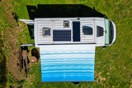 Top down birds view of campervan and motorhome. Drone photo of camper van or motor home, withroof...