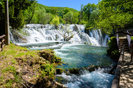 Amazing Martin Brod waterfalls on river Una in Bosnia and Herzegovina. Beautiful nature in Una national park with crystal clear water and amazing cascade waterfalls.の写真素材