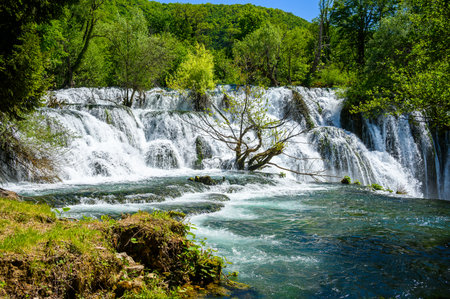 Amazing Martin Brod waterfalls on river Una in Bosnia and Herzegovina. Beautiful nature in Una national park with crystal clear water and amazing cascade waterfalls.の写真素材