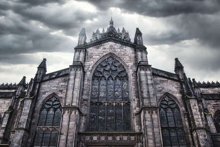 St. Giles Cathedral (High Kirk of Edinburgh). Creepy church with cloudy sky in the background. Cathedral in bad weather.の写真素材