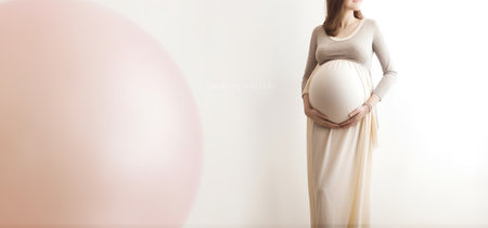Beautiful pregnant woman with pink belly, in the style of nostalgic minimalism, light silver and beige, Generative AIの素材