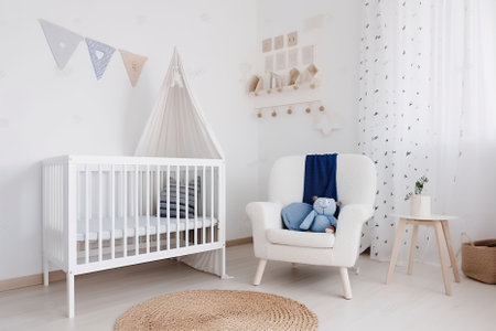 Serenity in Simplicity, A Stylish Unisex Nursery with a White Crib and Minimalist Accents. Generative AIの素材