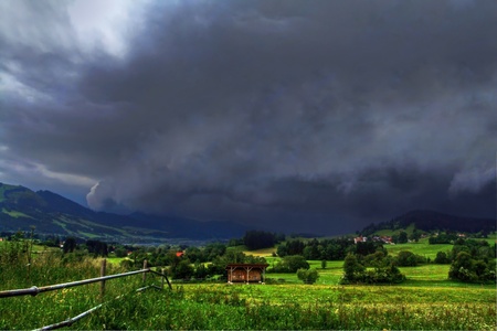 A violent storm moves across the landの写真素材
