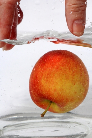 apple in the waterの写真素材