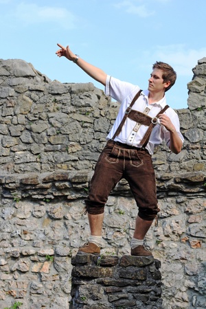 a young man in Bavarian lederhosenの写真素材