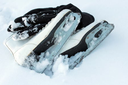 Winter sports - ice skates, hat and gloves