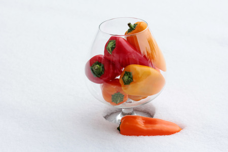 Fresh cold peppers in glassの写真素材