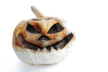 An old creepy pumpkin. A creepy pumpkin head for Halloweenの写真素材