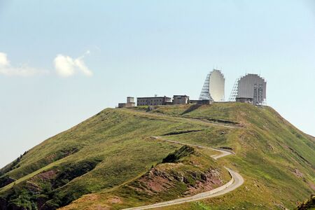 Earth station with huge satellite dishes on a mountain in Italyのeditorial素材