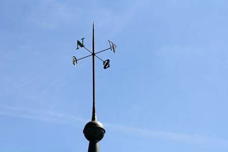 Wrought iron display of directions on a towerの写真素材