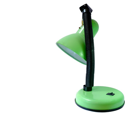 old broken green table lamp nand on bulk in isolatedの写真素材