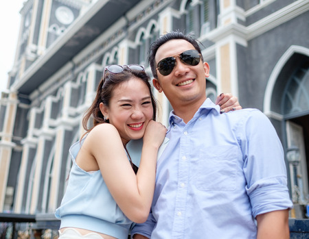 asian christian couple take a pre wedding at  cathedral outdoorの写真素材