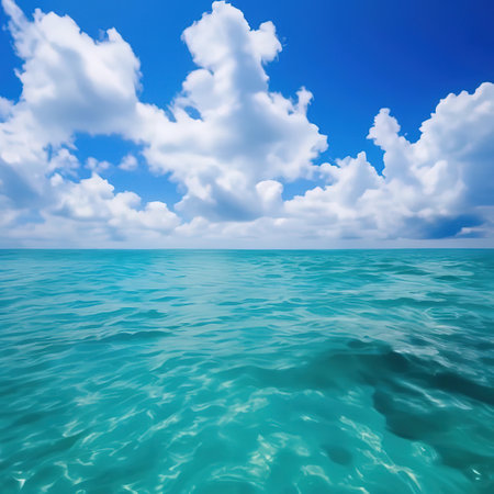 seascape background. sea and sky meet on the horizon. delicate blue color. clouds. tropical paradiseの素材