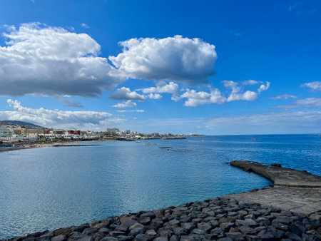 Beach of Fanabe in Costa Adeje town. Tenerife, Canary Islands, Spain. Early morning. Ocean barriersの写真素材