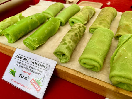 Traditional sweet asian dessert with coconut known as Green Rolled Pancakes or dadar gulungの写真素材