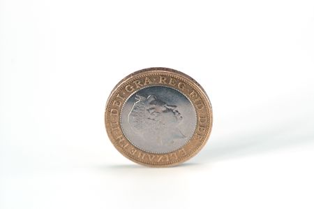 Two pounds coin against white backgroundの写真素材