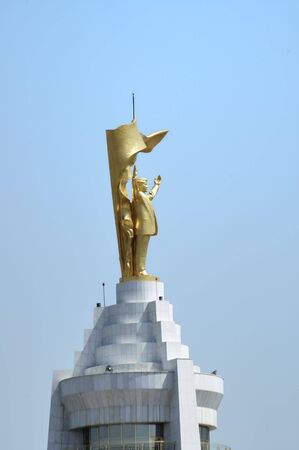 Golden statue on the top of Neutrality Archの写真素材