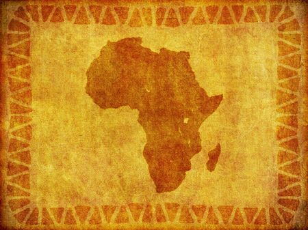 A background design of the continent of Africa imprinted on a piece of aged material.の写真素材
