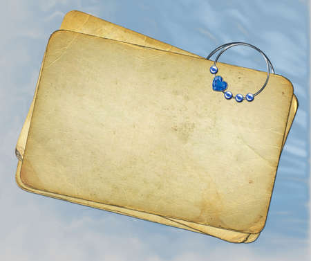 grunge papers with paperclip on blue backgroundの写真素材